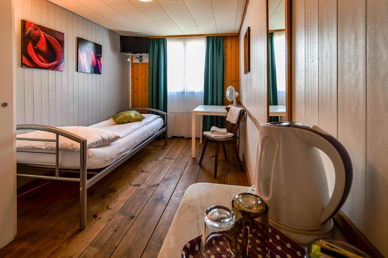Hotel Tell And Apartments Unterseen Exterior photo