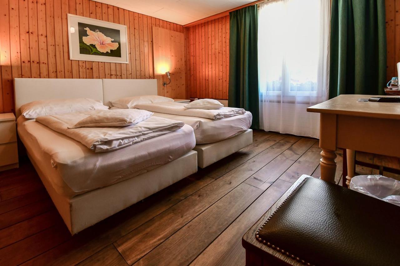 Hotel Tell And Apartments Unterseen Exterior photo