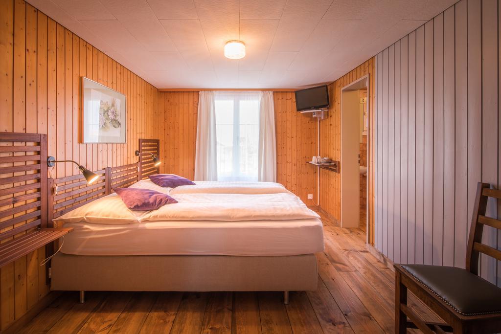 Hotel Tell And Apartments Unterseen Exterior photo